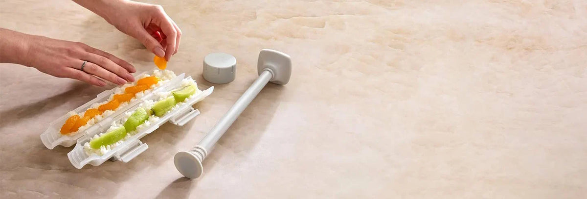 Modern kitchen tools on a bright countertop